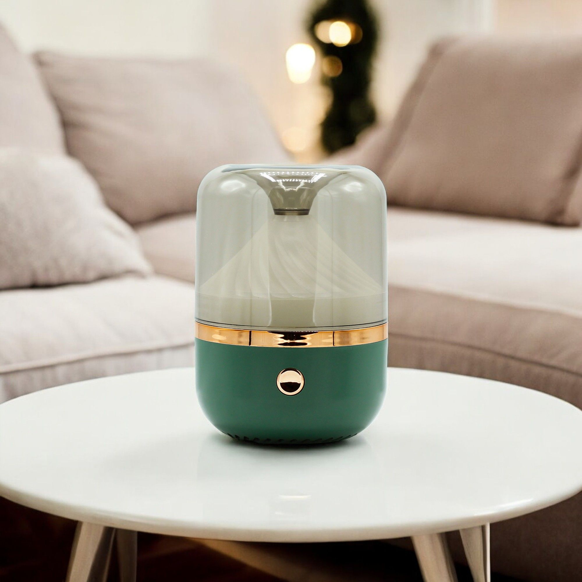 Difusor de aromas verde y blanco con detalle dorado sobre una mesa en un salón