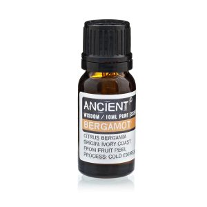 Frasco de aceite esencial de bergamota fcf 10 ml sobre fondo blanco.