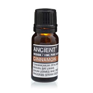Frasco de aceite esencial de canela 10 ml sobre fondo blanco.