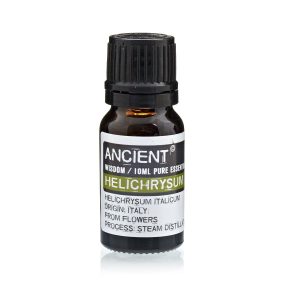 Frasco de aceite esencial de helichrysum 10 ml sobre fondo blanco