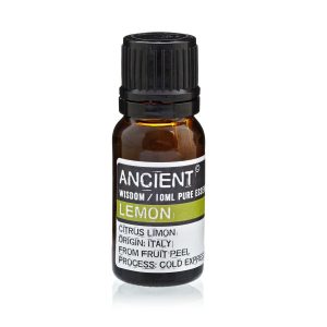 Frasco de aceite esencial de limón sobre fondo blanco