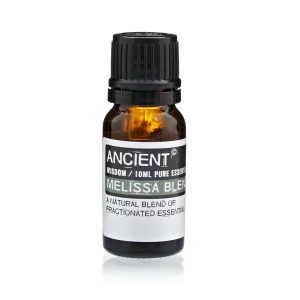 Frasco de aceite esencial de melisa (mezcla) sobre fondo blanco