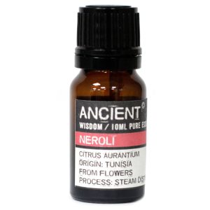 Frasco de aceite esencial de neroli puro sobre fondo blanco