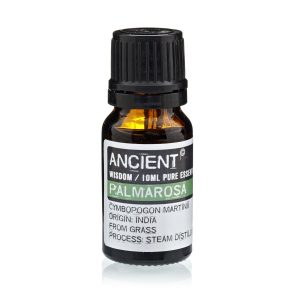 Frasco de aceite esencial de palmarosa sobre fondo blanco