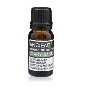 Frasco de aceite esencial de salvia esclarea sobre fondo blanco