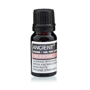 Frasco de aceite esencial de valeriana 10 ml sobre fondo blanco