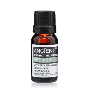 Frasco de aceite esencial de vetiver sobre fondo blanco