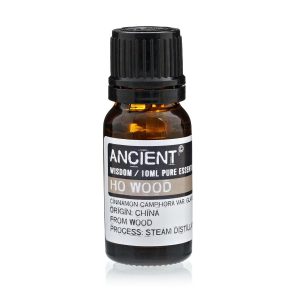 Frasco de aceite esencial ho wood 10 ml sobre fondo blanco.