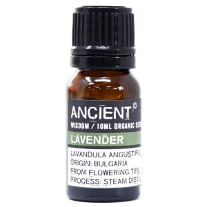 Frasco de aceite esencial orgánico de lavanda sobre fondo blanco