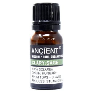 Frasco de aceite esencial orgánico de salvia esclarea sobre fondo blanco