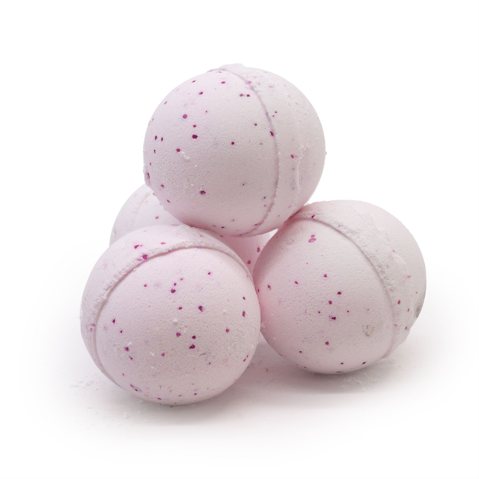Tres bombas de baño rosadas con pequeñas motas sobre fondo blanco correspondiente a bomba de baño con poción decadencia.